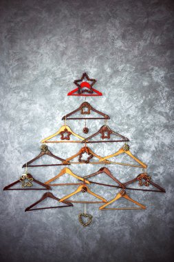 Christmas tree made of hangers clipart