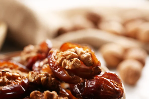 Walnut and date fruit — Stock Photo, Image