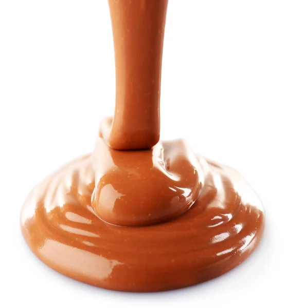 Melted milky brown chocolate pouring — Stock Photo, Image