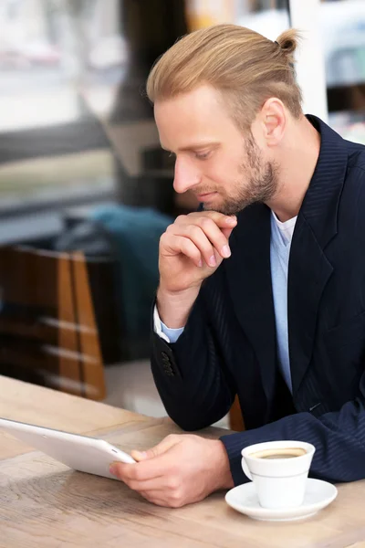 Young attractive businessman having lunch — Stock Photo, Image