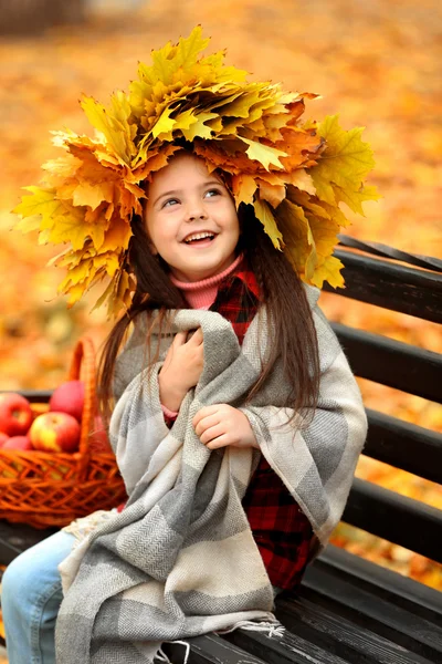 Happy young girl in yellow  wreath — Stock Photo, Image
