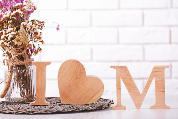 Wooden decor and flowers — Stock Photo, Image