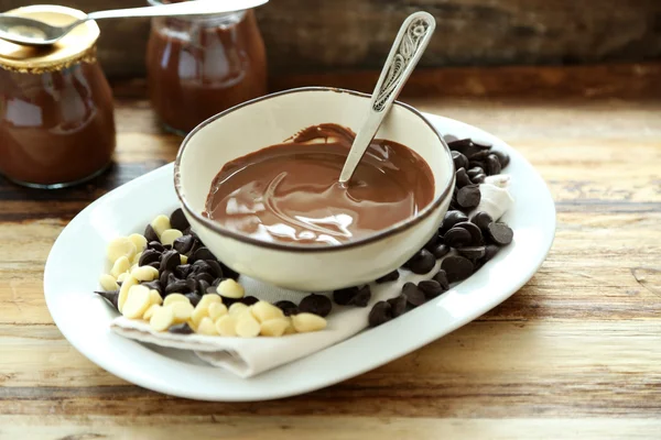 Melted chocolate in bowl — Stock Photo, Image