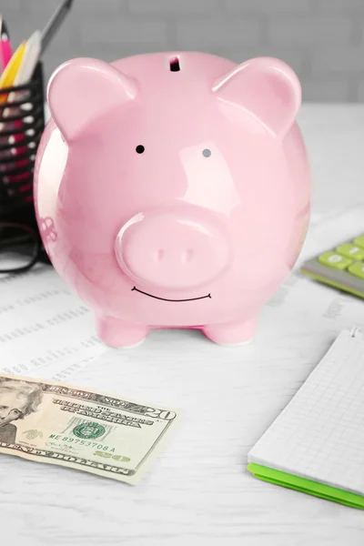 Piggy bank, calculator, dollars — Stock Photo, Image