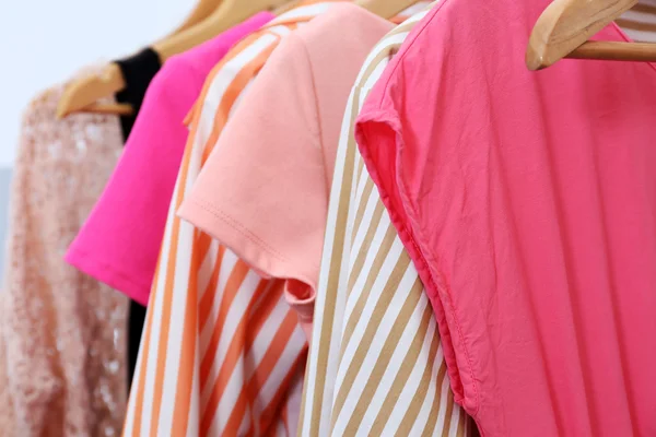 Female clothes on hangers, closeup — Stock Photo, Image