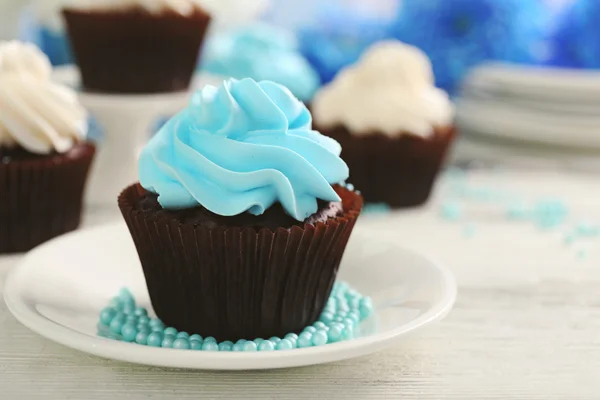 Cupcakes on wooden table — Stock Photo, Image