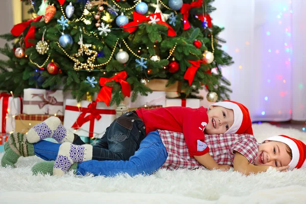 Two cute small brothers on Christmas — Stock Photo, Image