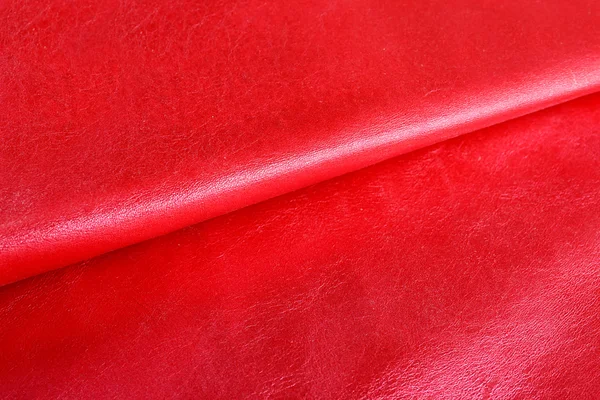 Rode glanzende leder texture close-up — Stockfoto