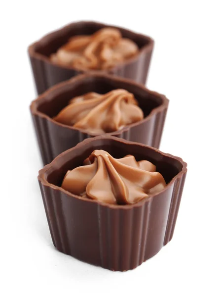 Three chocolate praline candies, isolated on white — Stock Photo, Image