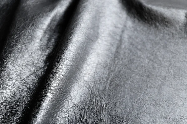 Preto enrugado couro textura fundo — Fotografia de Stock