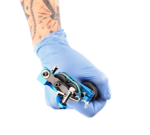 Mão na luva com máquina de tatuagem — Fotografia de Stock