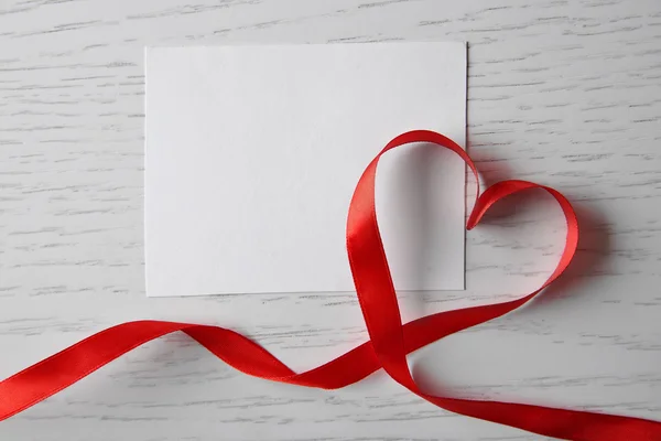 Blank present card with ribbon — Stock Photo, Image