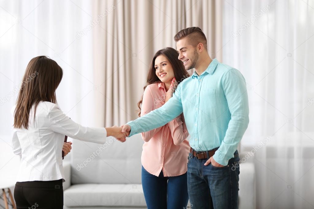 Man shaking hands with estate agent