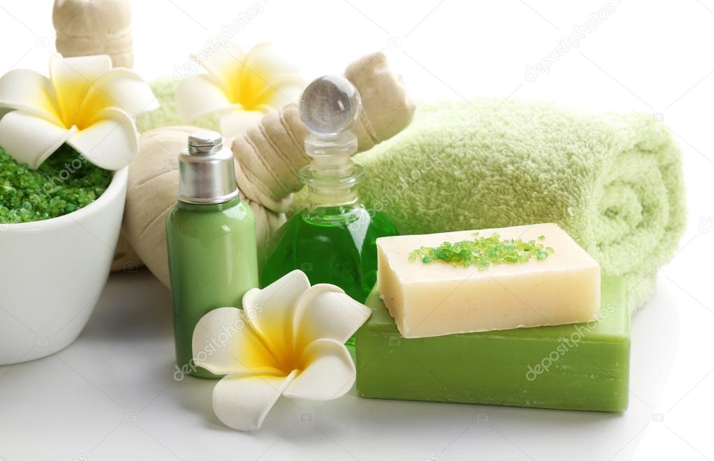 Spa set with exotic flower on white background, close up