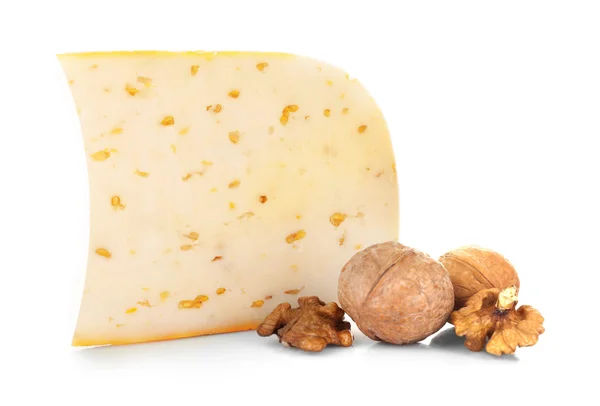 Queso con nueces sobre blanco —  Fotos de Stock