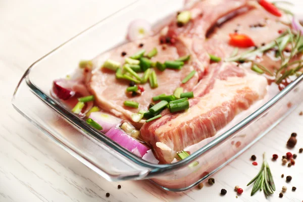 Marinating meat with spices — Stock Photo, Image