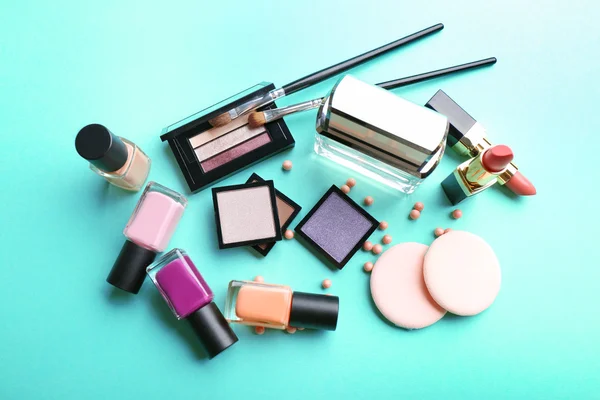 Cosmetics set on turquoise — Stock Photo, Image