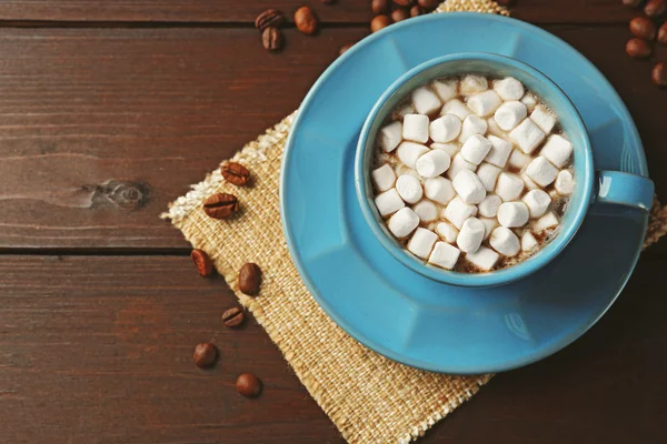 Mug of hot chocolate with marshmallows, on wooden background — Stock Photo, Image