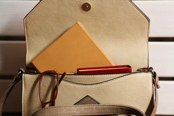 Female handbag with books — Stock Photo, Image