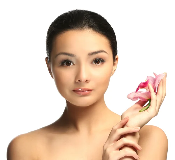 Hermosa mujer con flor de orquídea —  Fotos de Stock