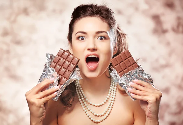 Young woman with chocolate — Stock Photo, Image