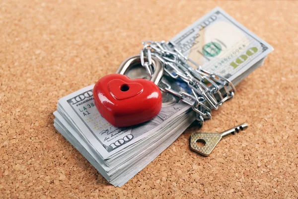 Dollars currency with lock and chain — Stock Photo, Image