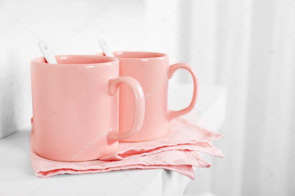 Pink cups and napkin