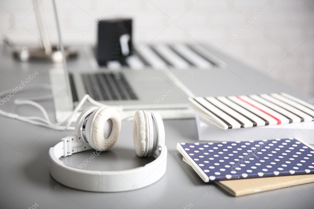 Headphones on grey table