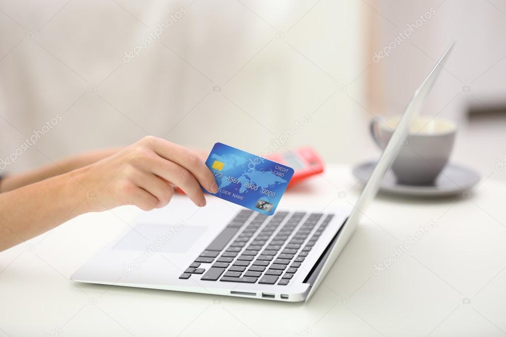 Female making online payment