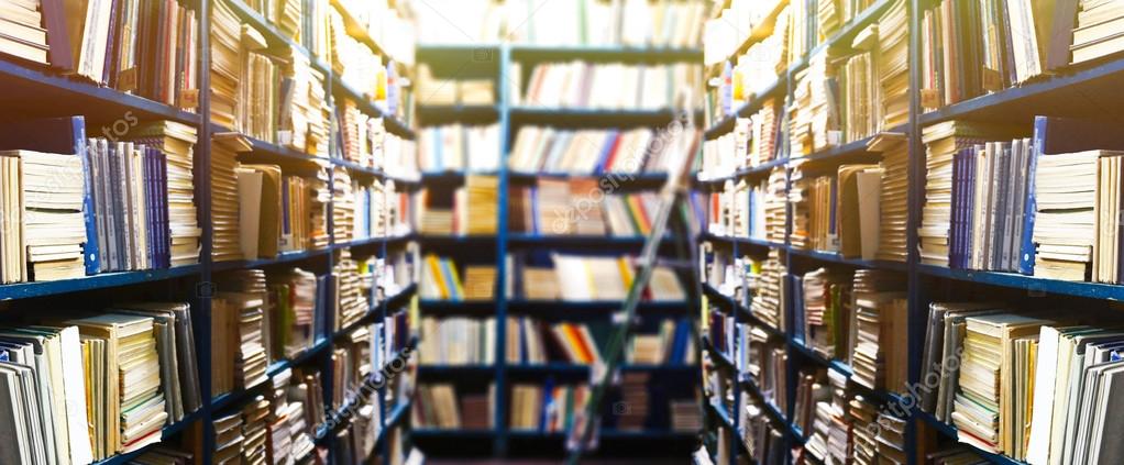 Library bookshelves with books