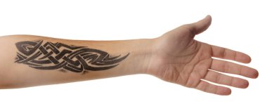 Abstract tattoo on male forearm clipart