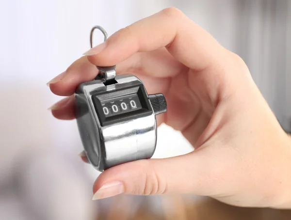 Chrome Stopwatch in hand — Stock Photo, Image