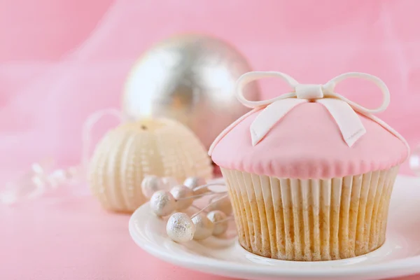 Tasty cupcake with candle and decorations, closeup — Stock Photo, Image