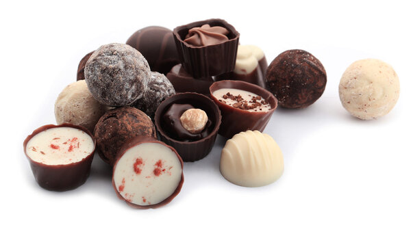 Assorted collection of chocolate candies and sweets, isolated on white