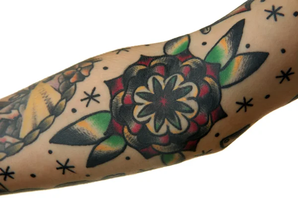 Květinové tetování na mužské loket — Stock fotografie