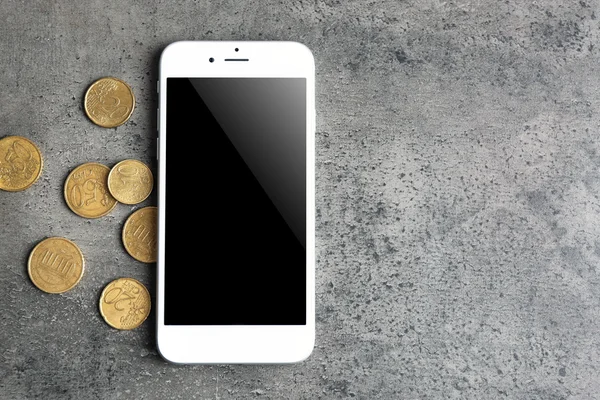 Mobile phone and money — Stock Photo, Image