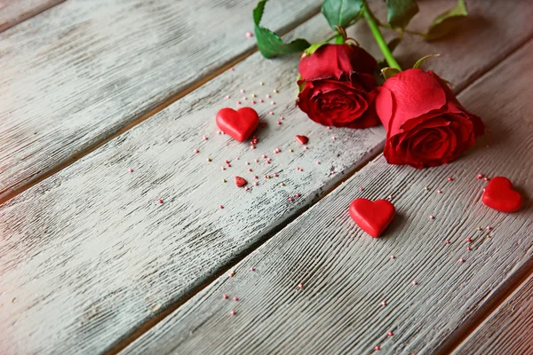 Beautiful roses with small hearts — Stock Photo, Image