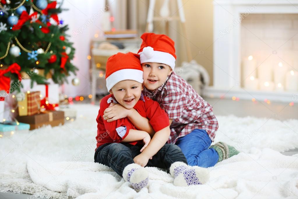 Two cute small brothers on Christmas