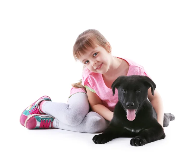 Menina com filhote de cachorro no branco — Fotografia de Stock