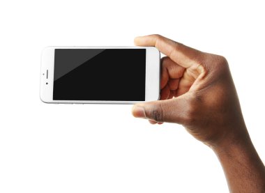 El ele tutuşan cep telefonu