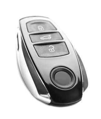 beyaz arkaplanda araba anahtarı