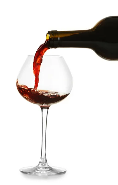 Red wine pouring in glass, isolated on white — Stock Photo, Image