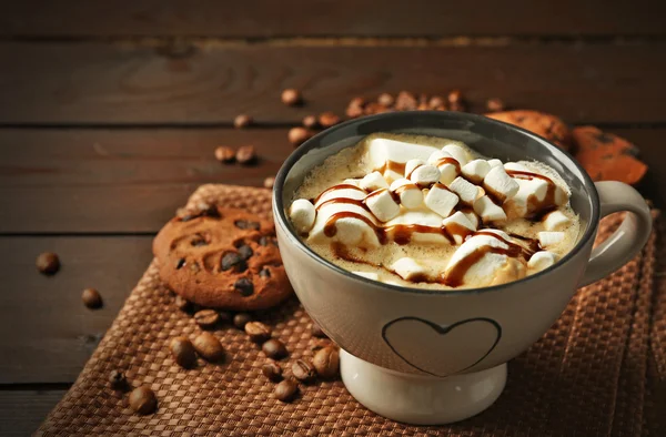 Mug of hot chocolate with marshmallows, on wooden background — Stock Photo, Image