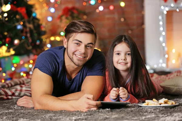 brother and little sister in Santa hat