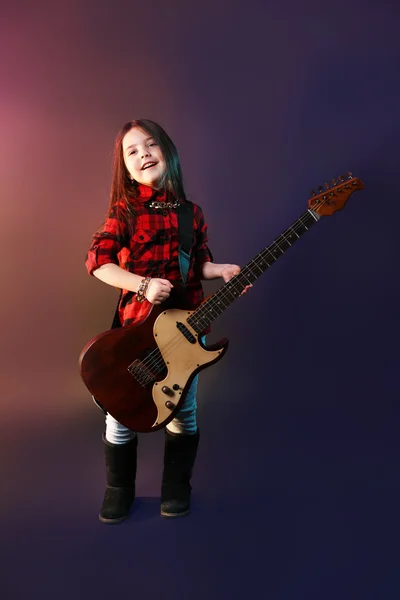 Little rock star playing guitar — Stock Photo, Image