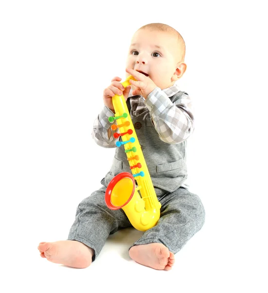 Imádnivaló baba műanyag színes szaxofon — Stock Fotó
