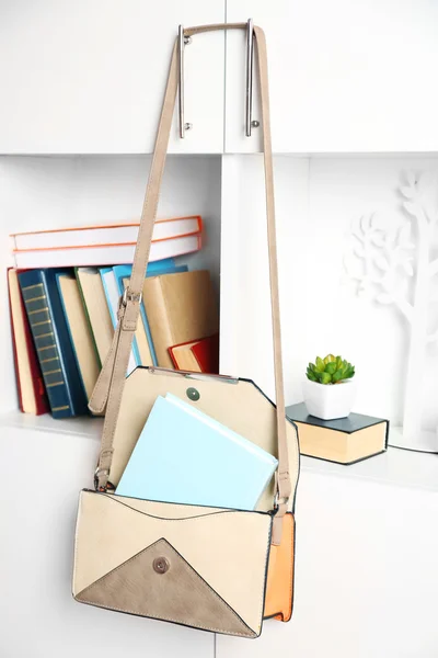 Female handbag with books — Stock Photo, Image