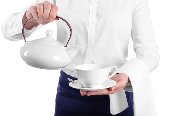 Kelner odlewania herbaty — Zdjęcie stockowe