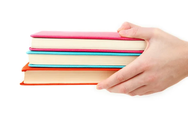 Mão feminina segurando livros — Fotografia de Stock