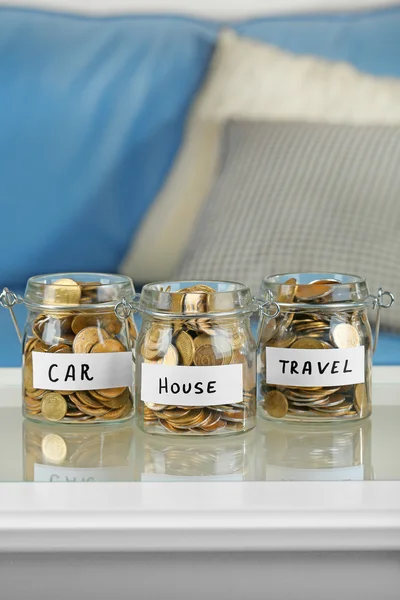 Jars full of coins — Stock Photo, Image